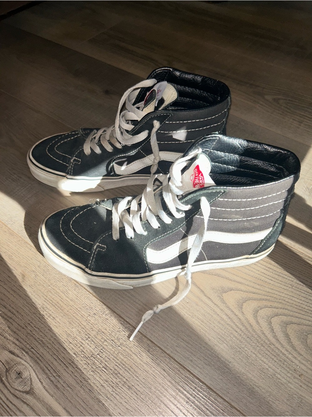 Vans Woman’s Sk8-Hi Black/White High-Top Sneakers